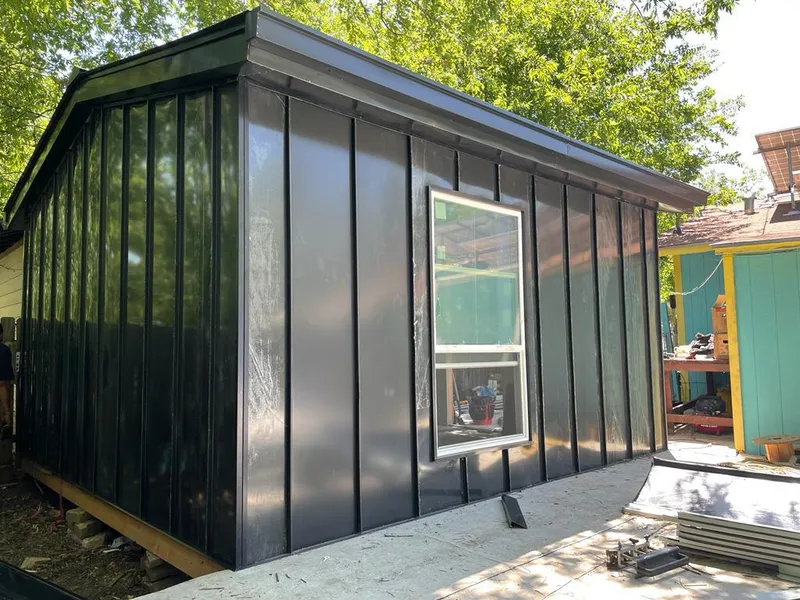 Black standing seam metal wall panels for Metal Roof Installation in Farmington